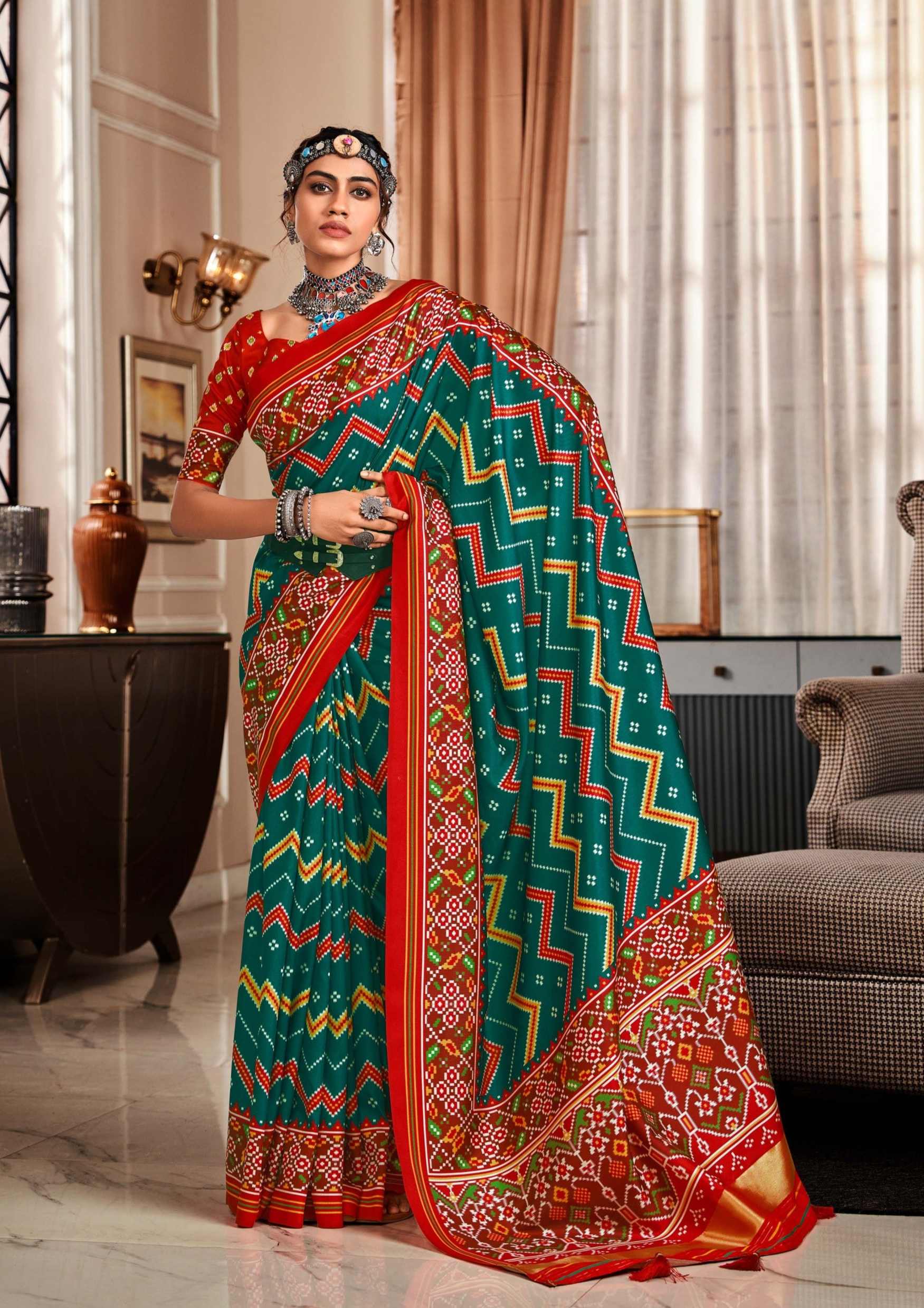 Vibrant Dual Tone Green and Red Printed Patola Silk Saree