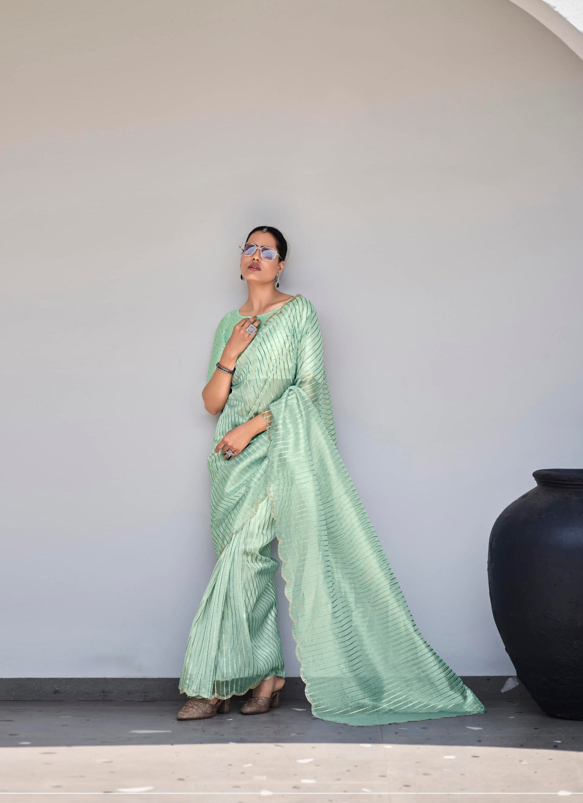 Enchanting Light Green Organza Silk Saree