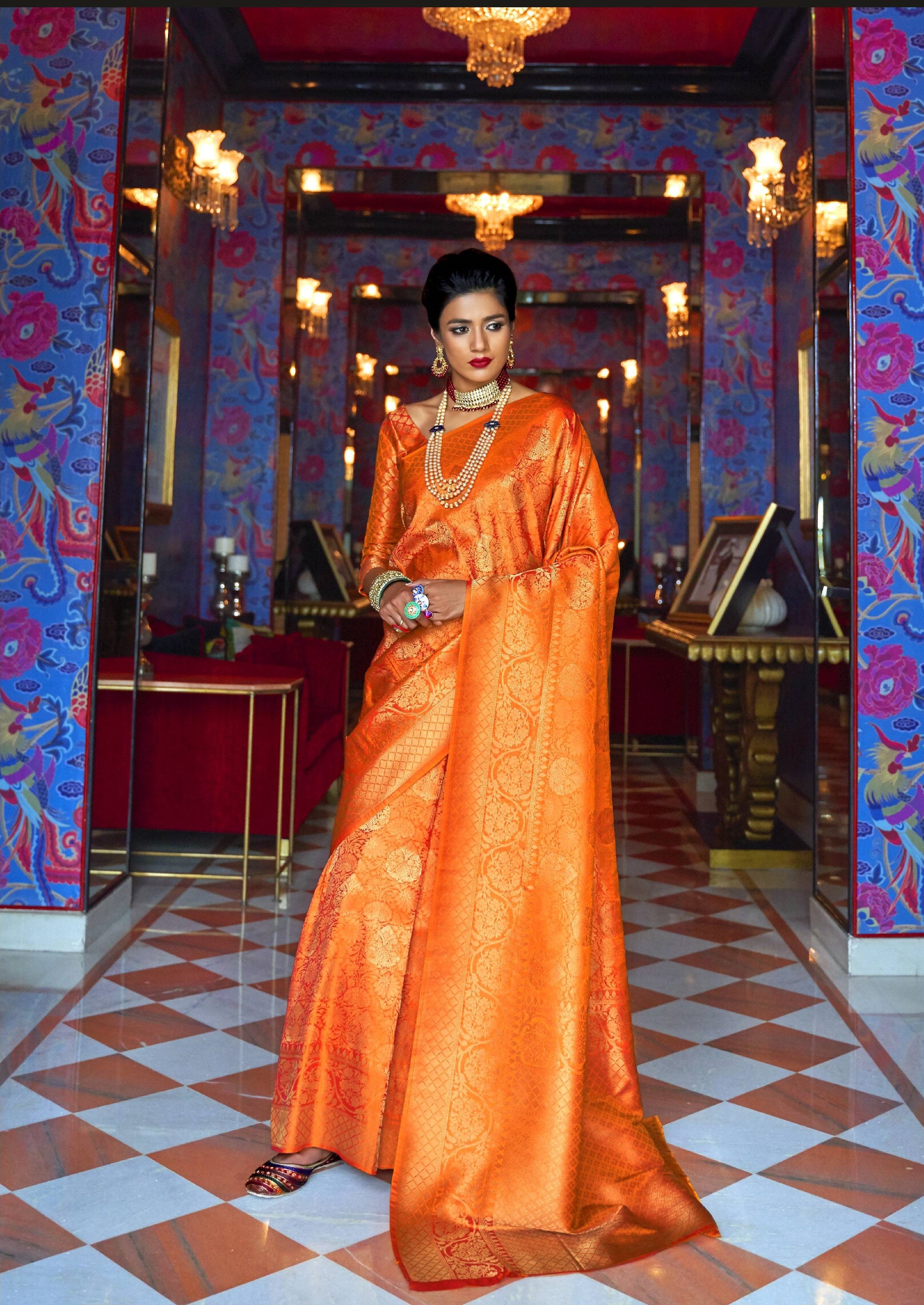 Vibrant Sunset Tangerine Zari woven Kanjivaram saree