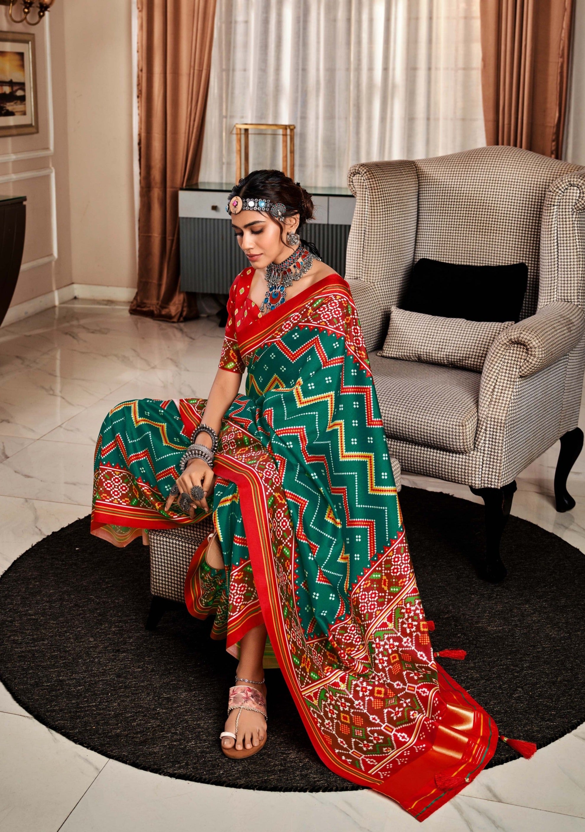 Vibrant Dual Tone Green and Red Printed Patola Silk Saree