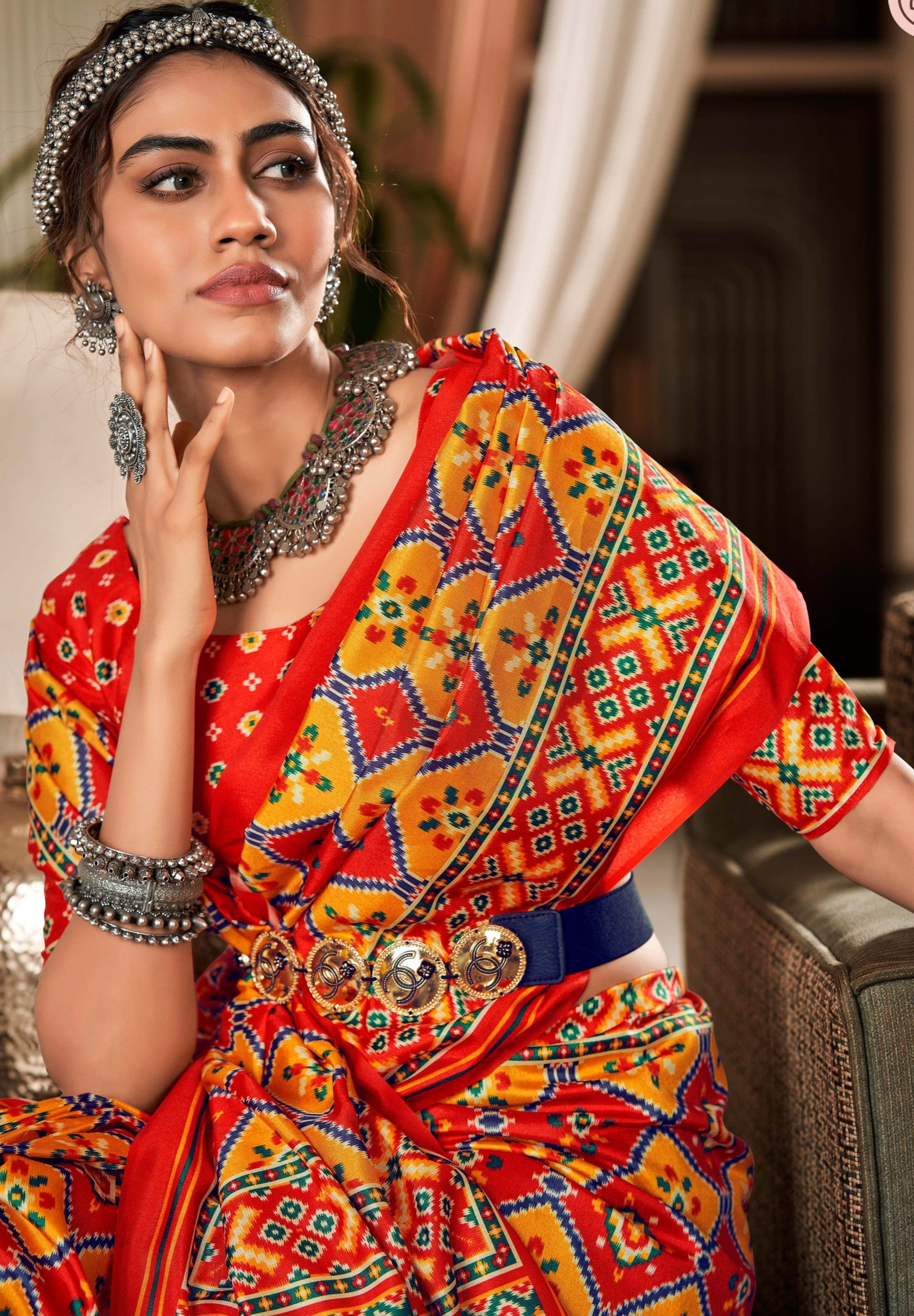 Sunset Symphony Dual Tone Yellow and Red Printed Patola Saree