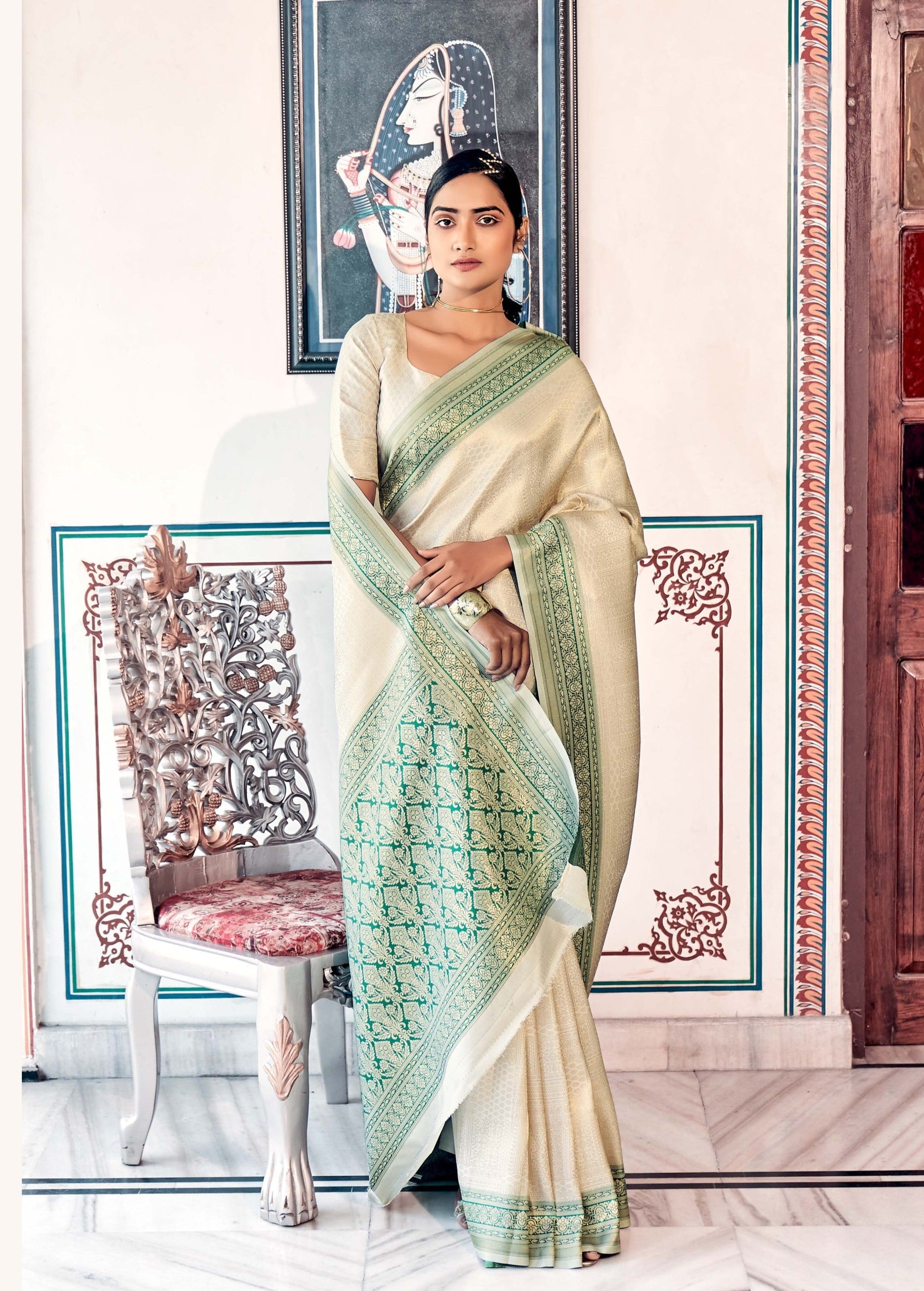 Porcelain White and Green Woven Kanjivaram Silk Saree