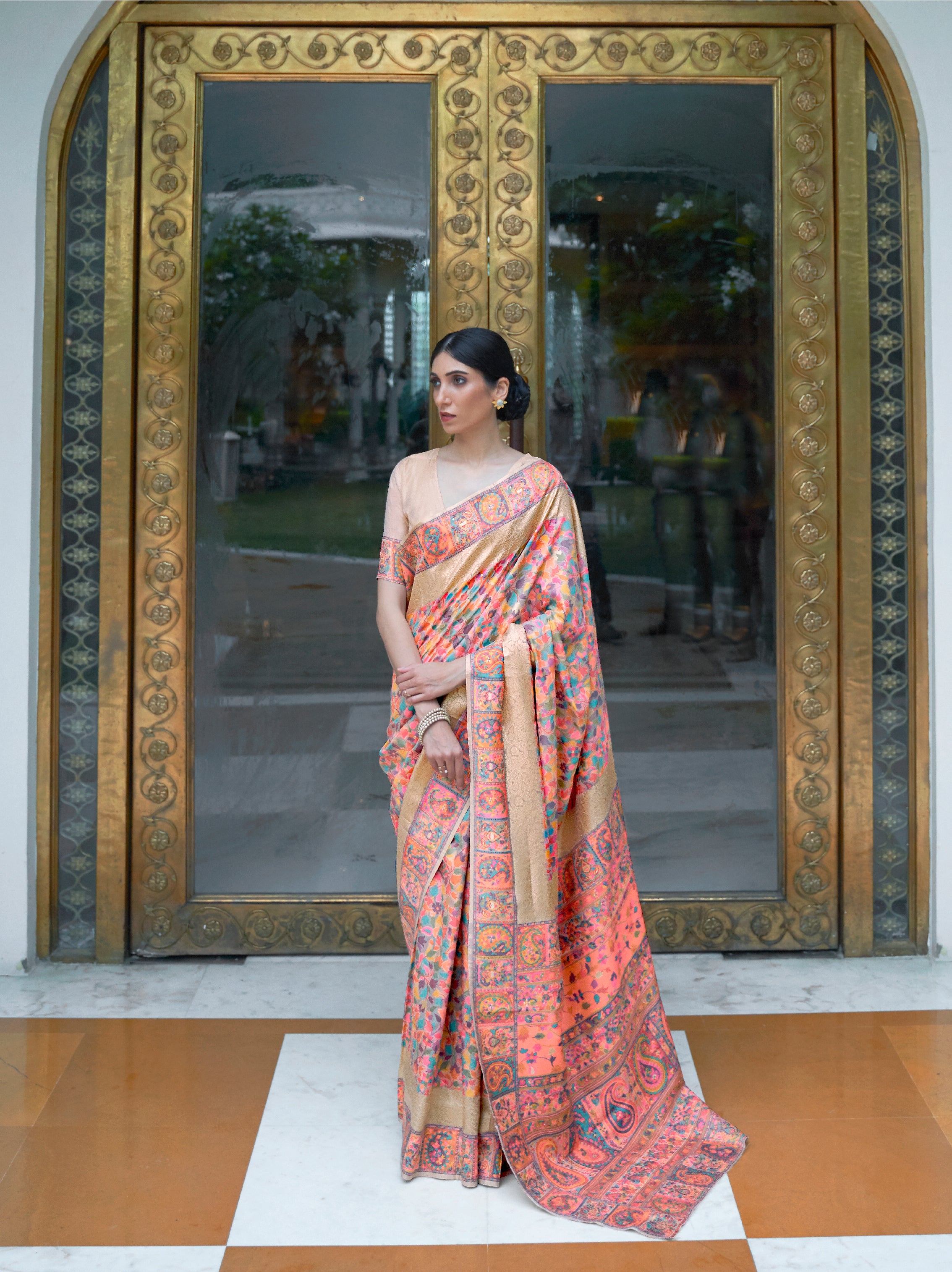 Enchanting Peach Kashmiri Modal Silk Saree