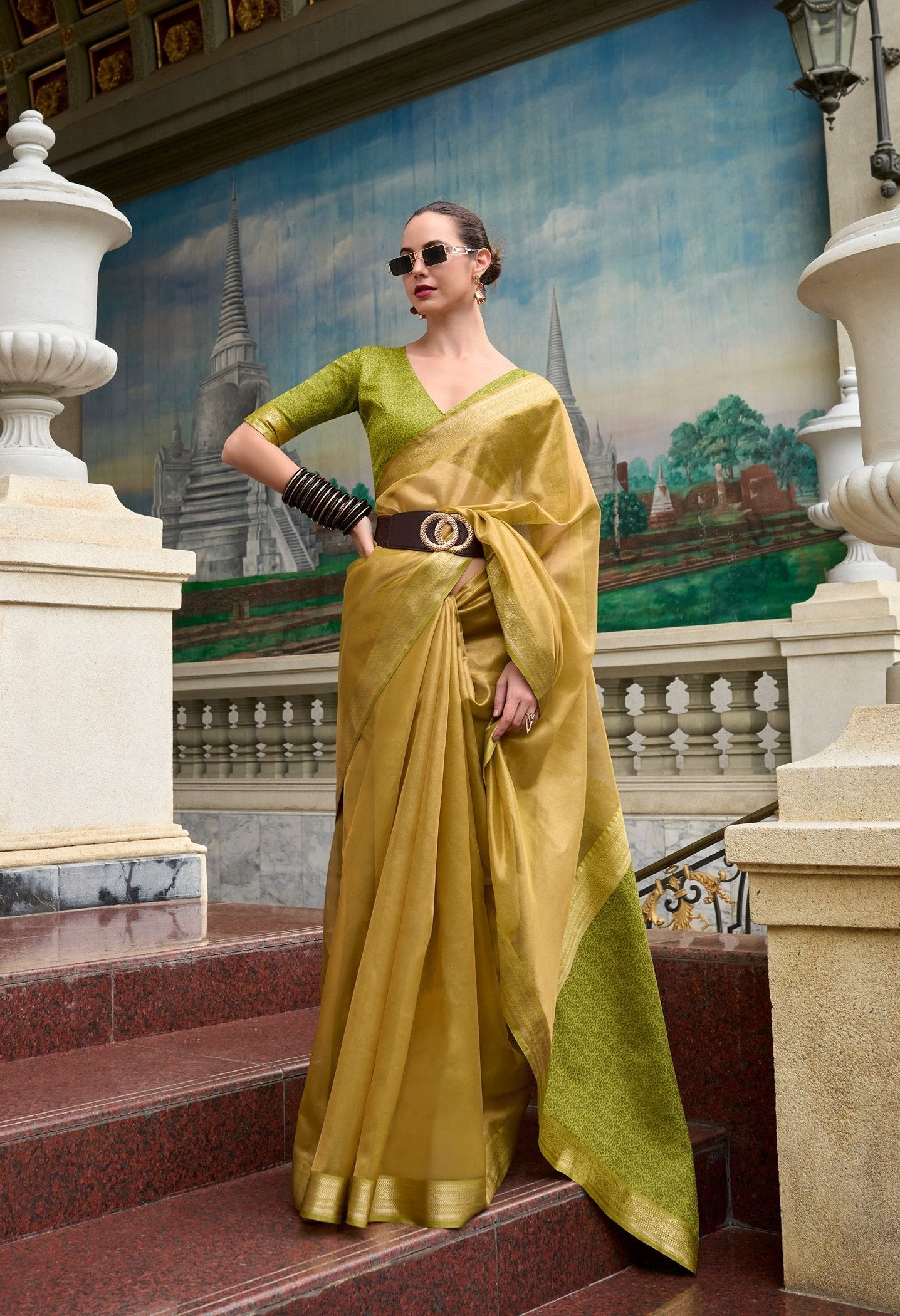 Elegance in Every Hue: Green and Gold Pure Tissue Silk Saree"