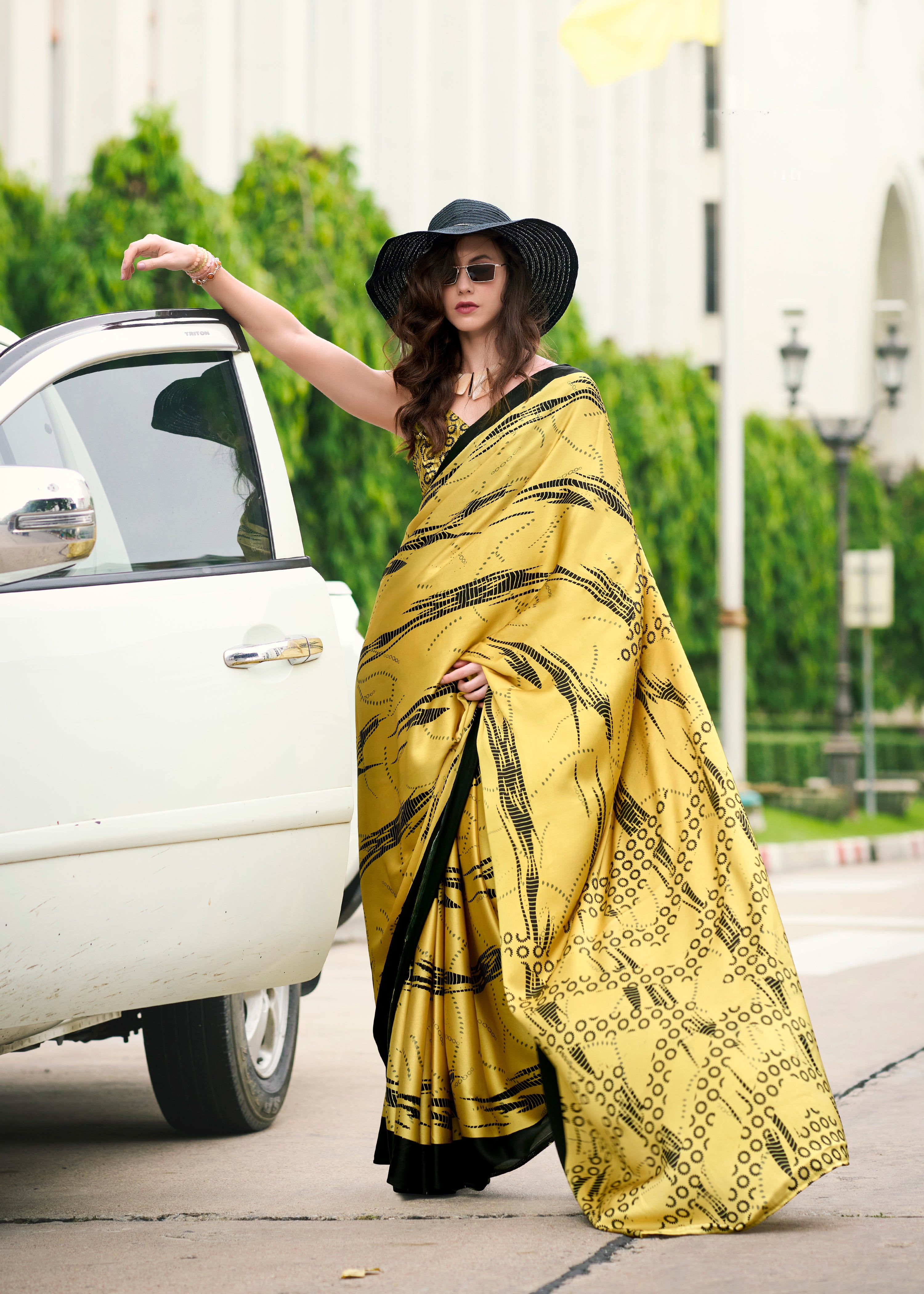 Majestic Royal Yellow color Japan Sattin Saree