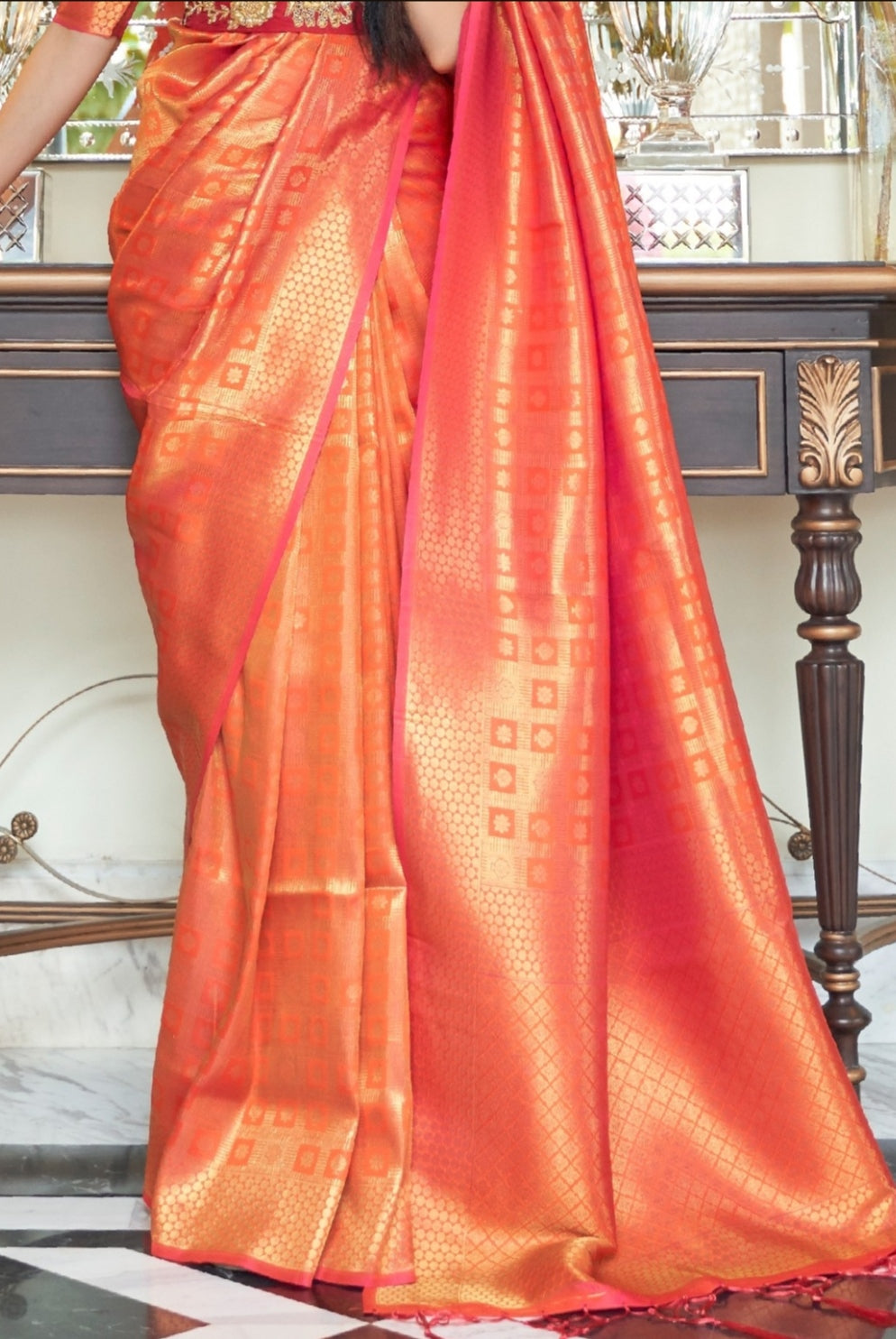 Luminous Orange Pearl Woven Kanjivaram Saree