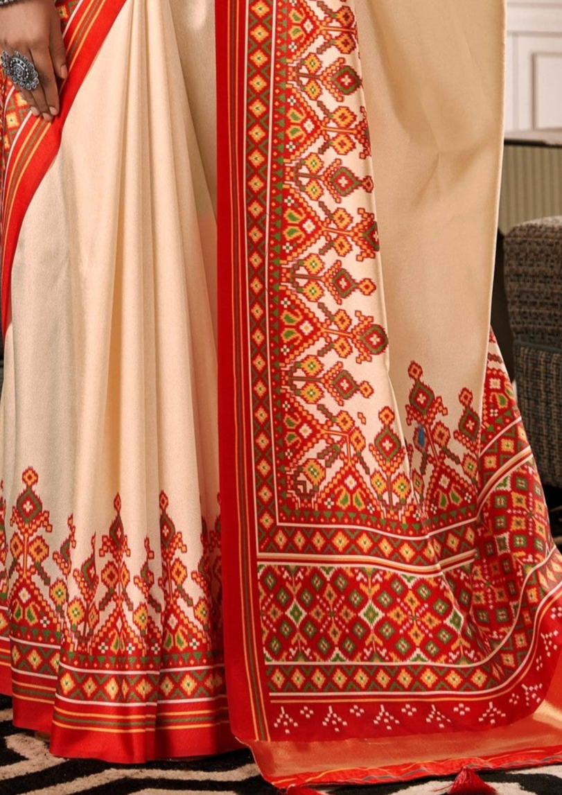 Ethereal Elegance Dual Tone Cream and Red Patola Saree